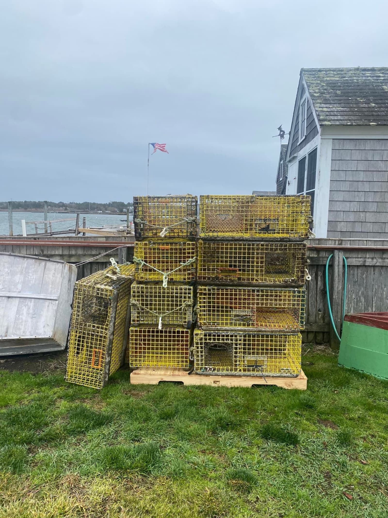 Lobster traps stacked at the harbor